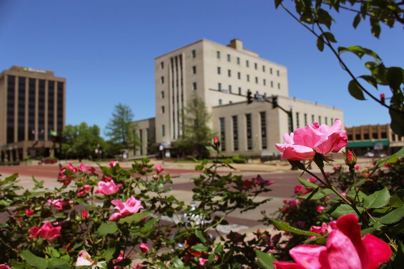 Smith County Courthouse in downtown Tyler, Texas — rose bushes in foreground